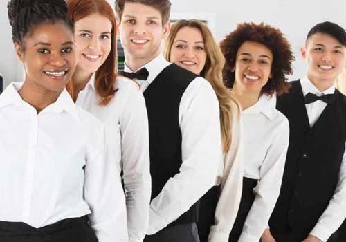 From Aprons to Blazers: A Look at the Advancement of Restaurant Uniforms