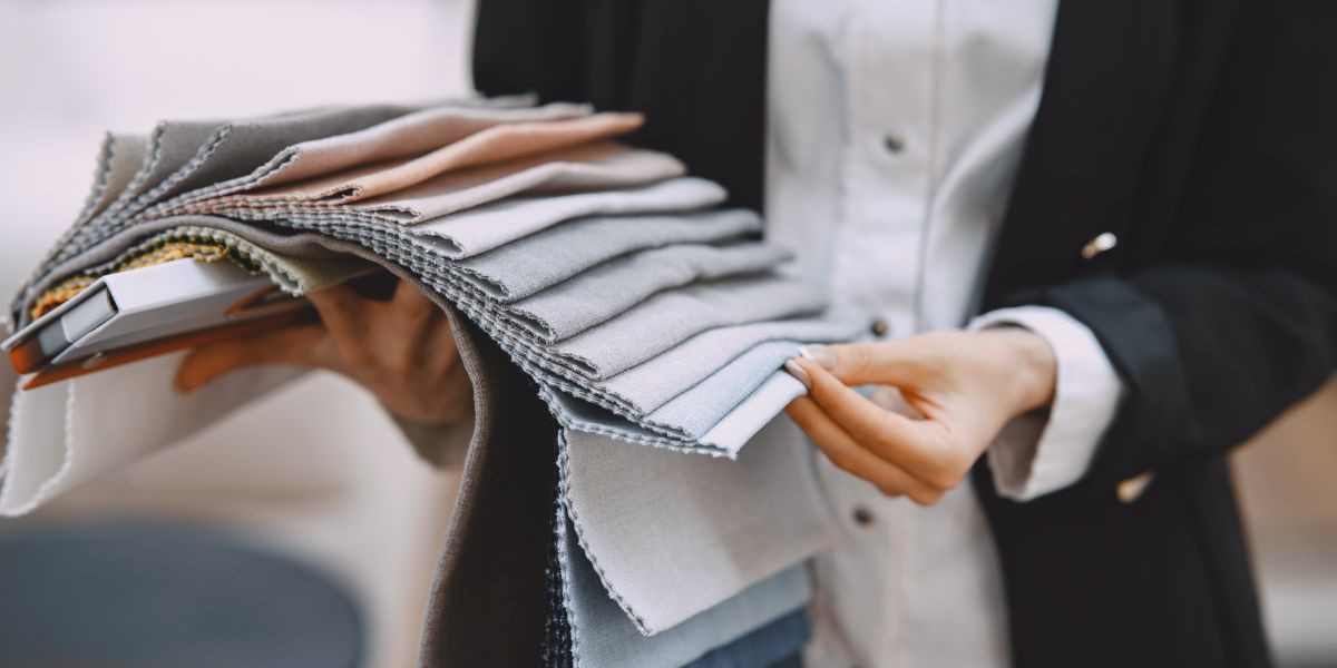 7 Best Corporate Uniform Fabrics That Actually Survive Mumbai’s Brutal Climate Trusted by Top Corporate Uniform Manufacturers in Mumbai